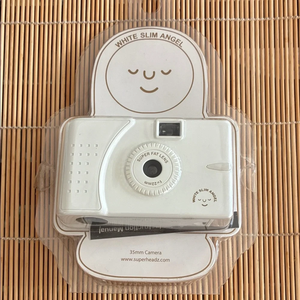 White Slim Angel 35mm Camera by - White